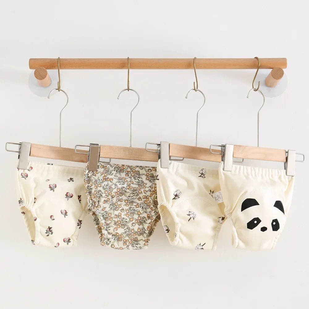 Dites adieu aux couches jetables ! Cette culotte réutilisable en coton accompagne bébé vers la propreté tout en respectant l’environnement.