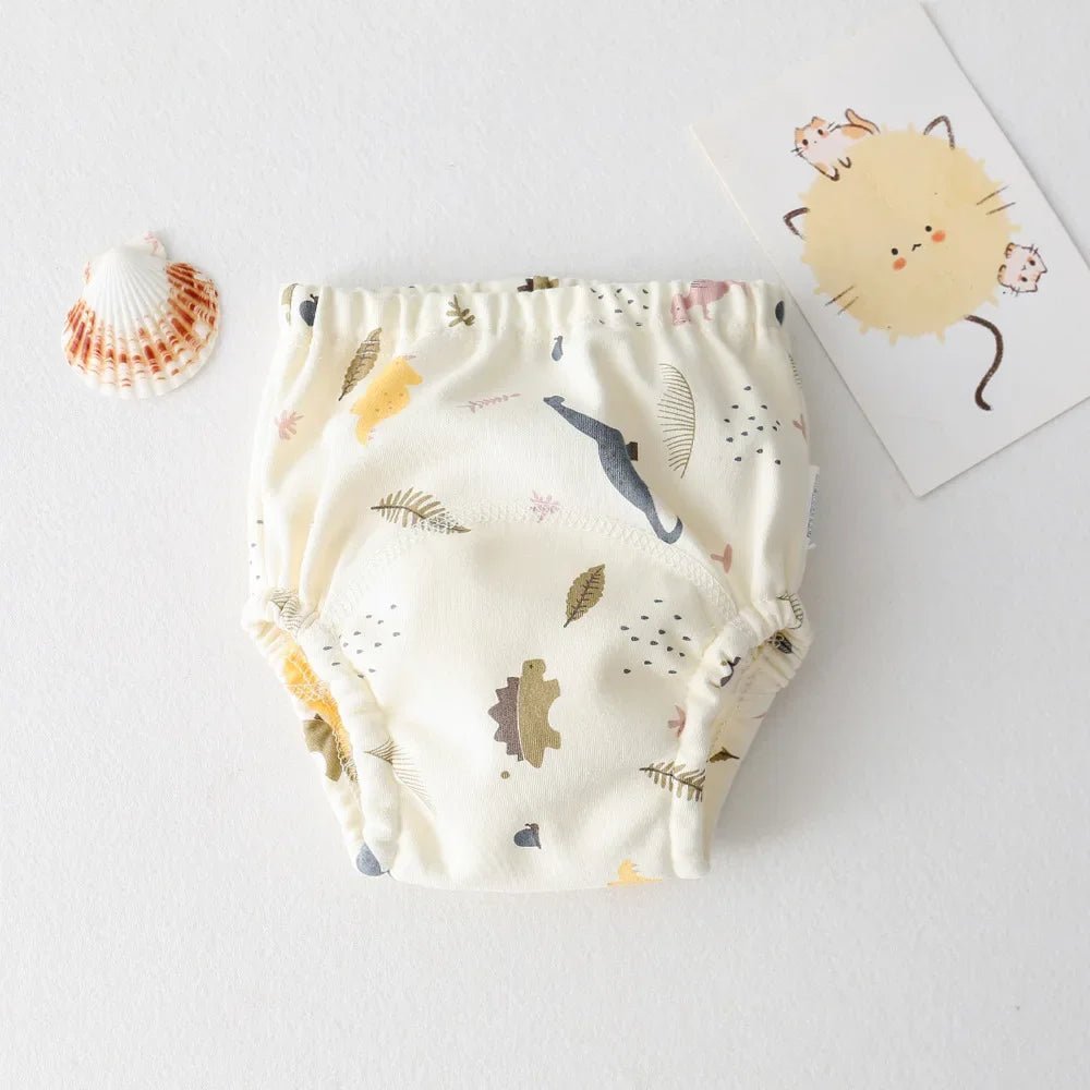 Culotte d'apprentissage - KIDEE Faites de la propreté une aventure avec cette culotte d’apprentissage dinosaure ! Absorbante et agréable à porter, elle accompagne votre enfant en douceur.